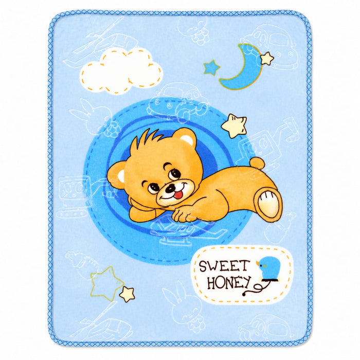 A square baby blanket with a light blue background and a stitched border, featuring a cartoon teddy bear in a space capsule with stars, clouds, and the text 'SWEET HONEY'.