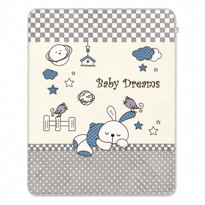 A baby blanket or throw featuring a whimsical space-themed design with the words 'Baby Dreams'. The design includes a white bunny with blue striped socks, stars, clouds, a bird, a moon, and a small house on an off-white background, framed by gray and whit