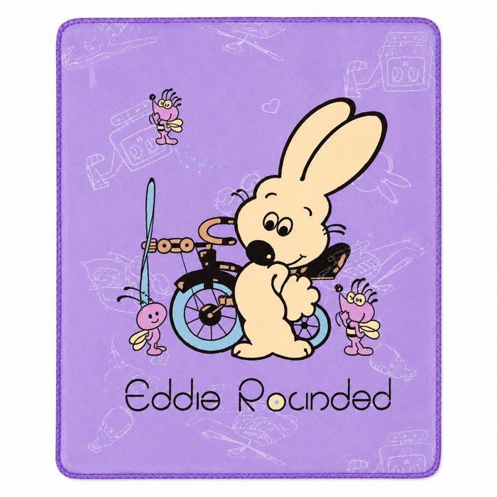 A square purple mousepad featuring a cartoon illustration of a beige rabbit riding a bicycle with pink and yellow insects, and the text 'Eddie Rounded' at the bottom.
