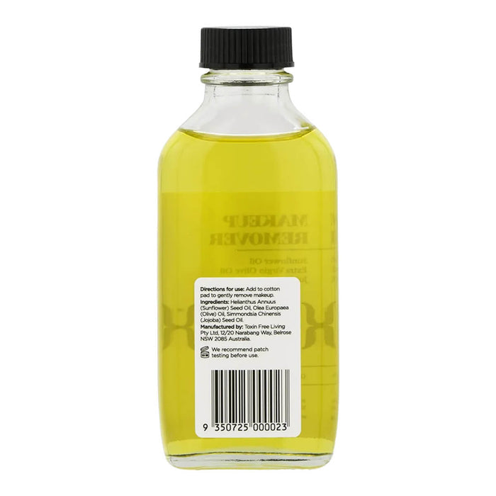 Bottle of yellow liquid with a black cap on a white background