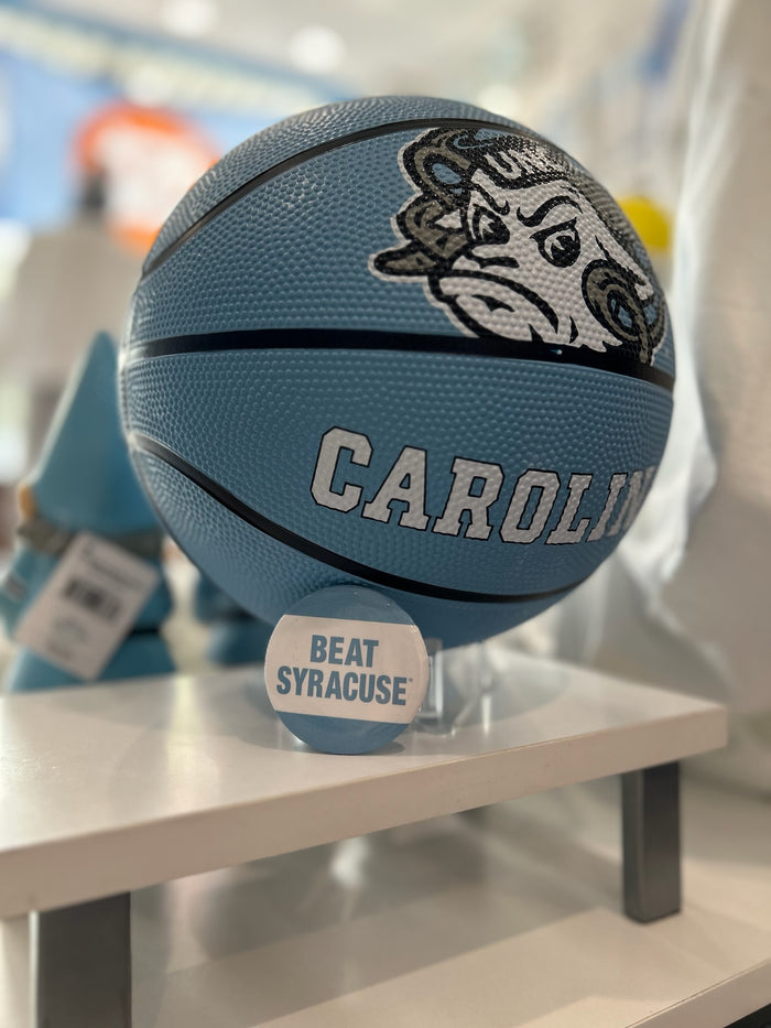 North Carolina Tar Heels Logo Brands Full Size Rubber Basketball - Lifestyle View - Logo Brands