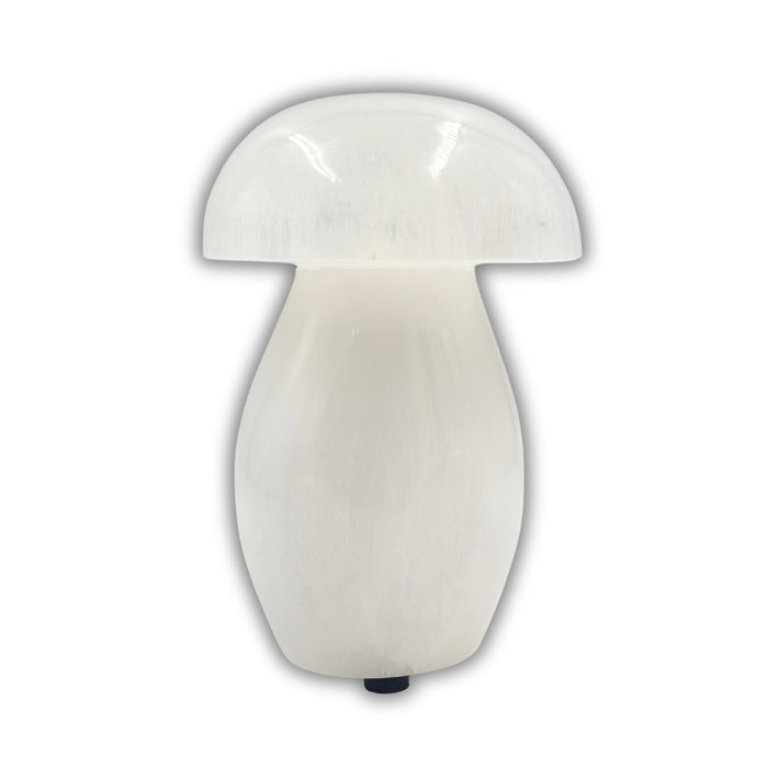 White mushroom-shaped lamp on a white background