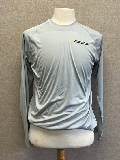 Gray long-sleeve shirt on a mannequin against a gray wall