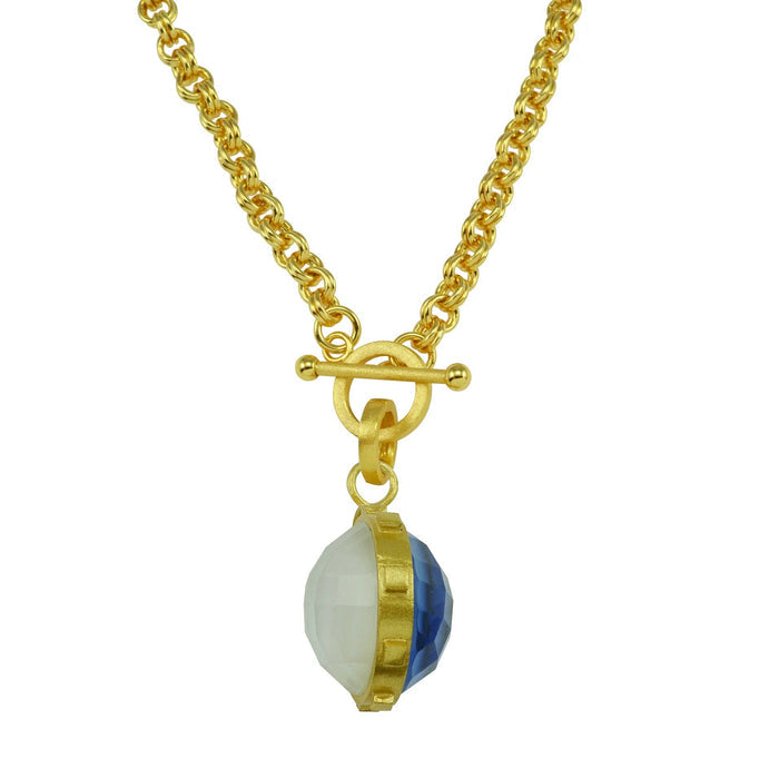 Gold necklace with a toggle clasp and a multicolored pendant on a white background