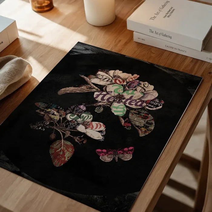 Botanical 7 Floral Black Typography Print: striking graphic art with colorful petals and a pink butterfly on dark paper.