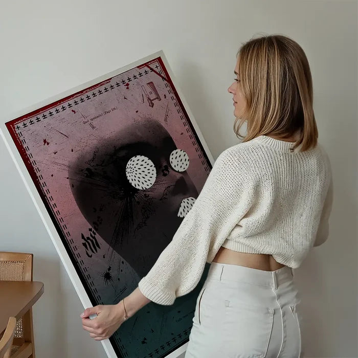 Woman holding a large "Chaos Blend 1" abstract figurative art print with a pink and green gradient, black figure, and white graphic elements.
