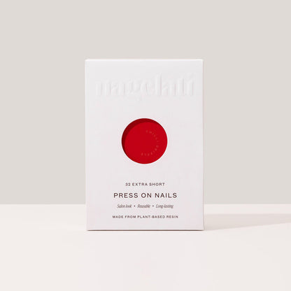 Press-on nails in plastic-free packaging made from FSC-certified paperboard.