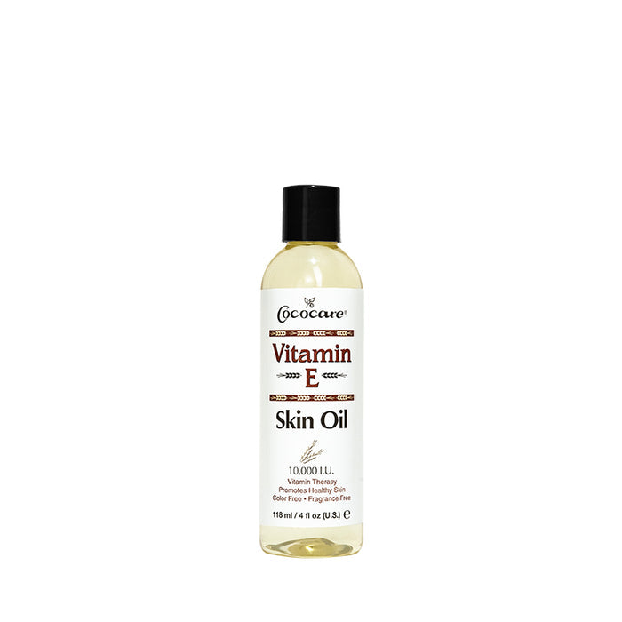 COCOCARE Vitamin E skin oil for face in clear 4 fl oz bottle with black cap moisturizing formula