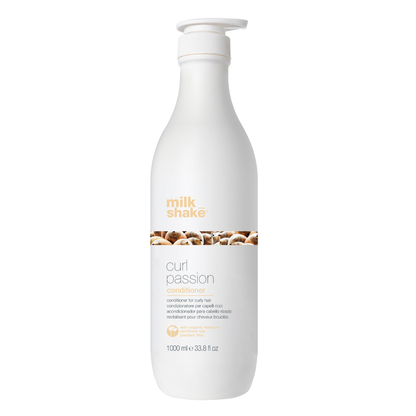 White bottle of milk_shake Curl Passion conditioner on a white background