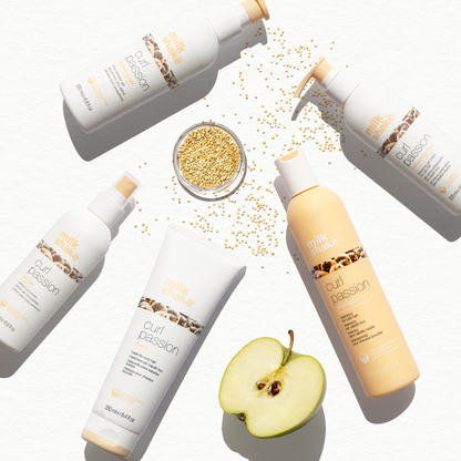 Hair care products with milk_shake  'curl passion' branding on a white background
