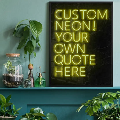 Yellow custom neon sign print on black background, framed, displayed on a teal shelf with plants.