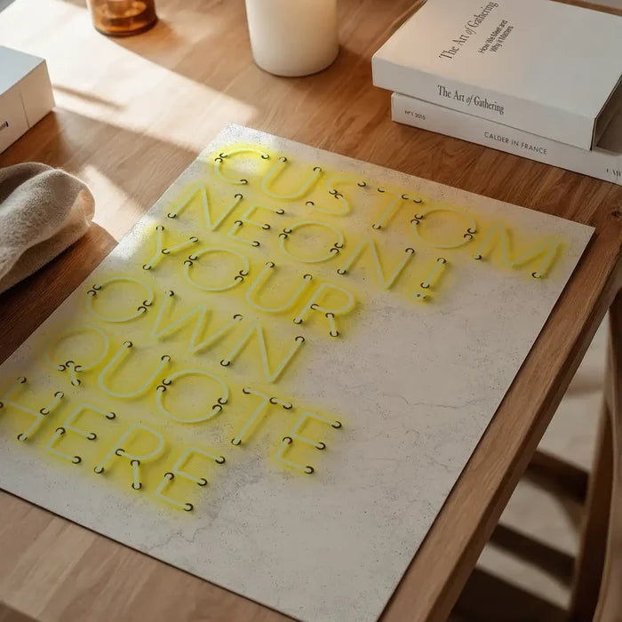 Custom yellow neon print on a textured white background, displaying "CUSTOM NEON! YOUR OWN QUOTE HERE".