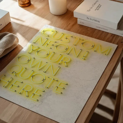 Custom yellow neon print on a textured white background, displaying "CUSTOM NEON! YOUR OWN QUOTE HERE".