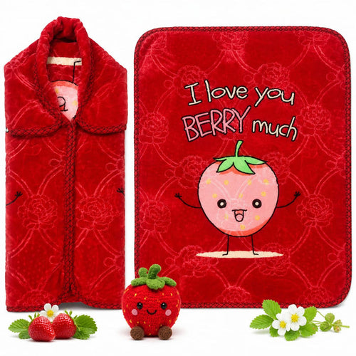 A red plush blanket set featuring a folded view on the left and a flat view on the right with the text 'I love you BERRY much' and a cute cartoon strawberry. A small plush strawberry toy and decorative fresh strawberries and flowers are placed in front on