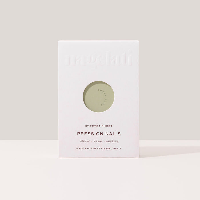 Press-on nails in plastic-free packaging made from FSC-certified paperboard.