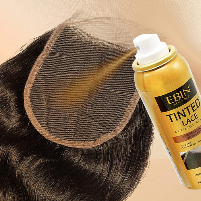 EBIN Tinted Lace aerosol can spraying darkest brown lace tint spray onto lace closure over dark brown hair for seamless hairline
