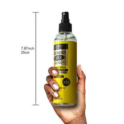 EBIN Wonder Lace Bond extra mega hold lace wig spray bottle held in hand with 8 inch measurement