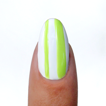 Electric Lime liner used for lime green vertical stripes on a sheer nude nail