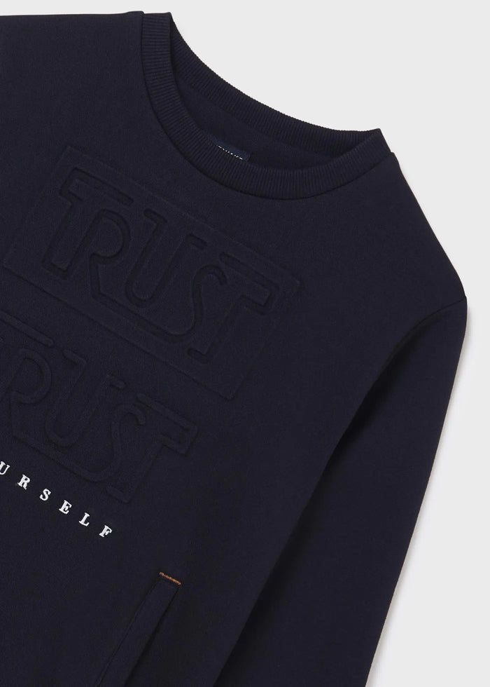 Closeup of Mayoral boys embossed graphic sweatshirt showing subtle front detail and cotton-blend fabric.