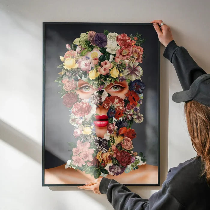 Flowerclava Black Floral Print art print, a striking graphic of a face made of colorful flowers in a black frame.