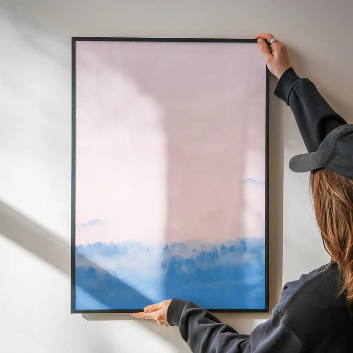 Forest Pink Blend Print: Graphic art on archival paper, featuring misty blue trees and a pink sky.