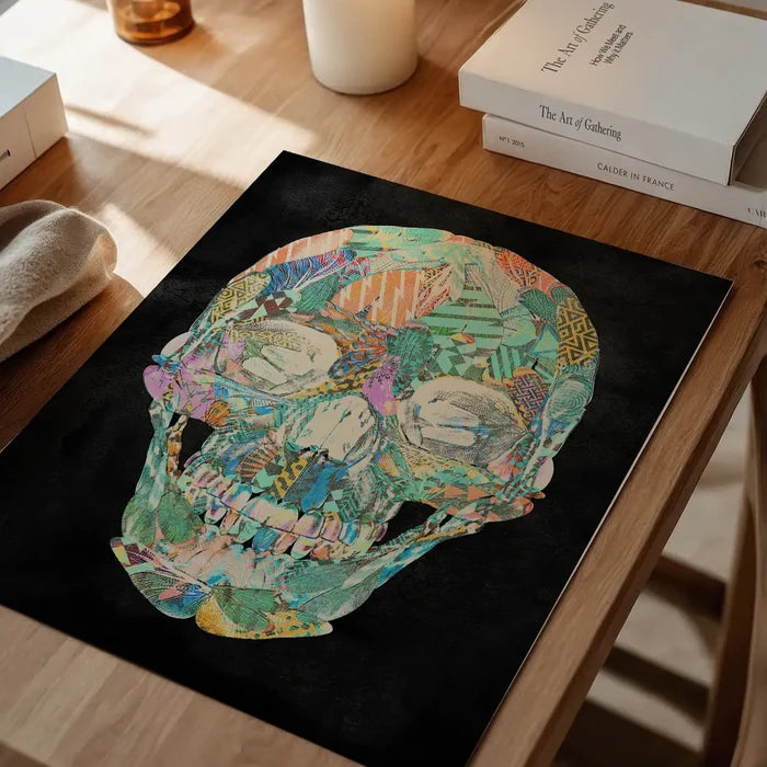 Geometric pastel pattern skull print on black art paper.
