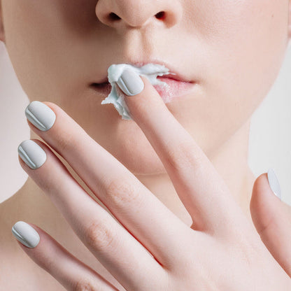 Glossy light blue nails with a fresh twist