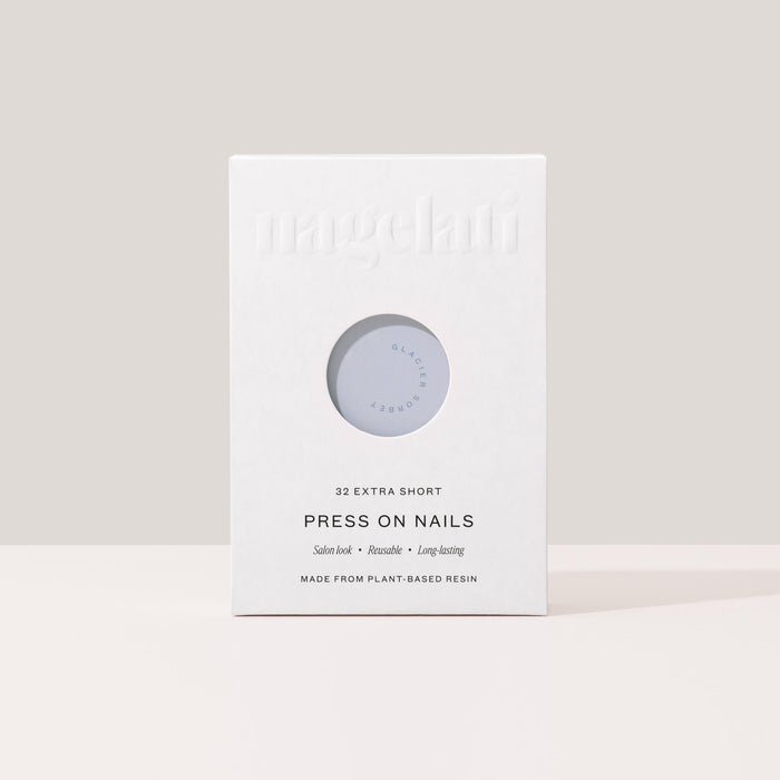 Press-on nails in plastic-free packaging made from FSC-certified paperboard.