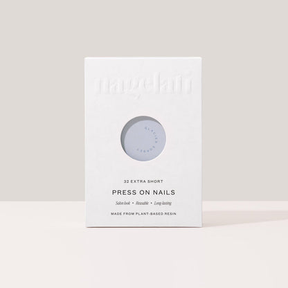 Press-on nails in plastic-free packaging made from FSC-certified paperboard.