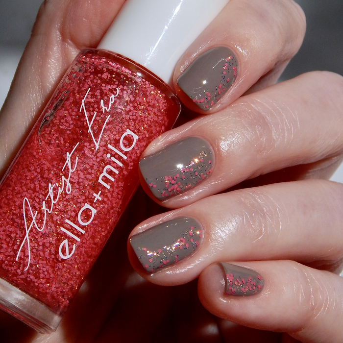 Glitter Era Rose Burst pink glitter liner accents on a taupe manicure, holding the bottle