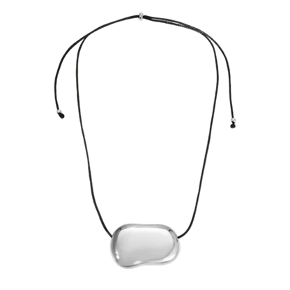 Necklace with a clear pendant on a white background