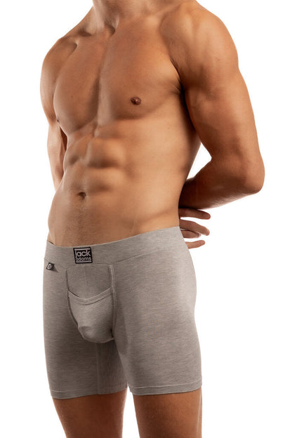 Shirtless man standing in front of a white background wearing a pair of Jack Adams In Motion Boxer Briefs in heather grey (profile view)