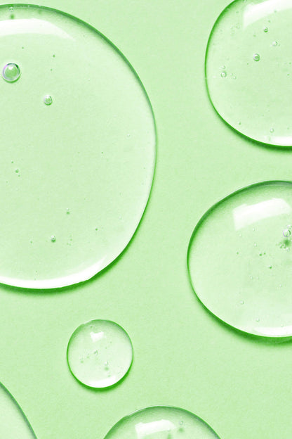 fresh water drops on a light green background