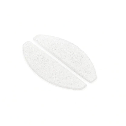 pair of clear glitter korean flat lash lifting shields on a white background