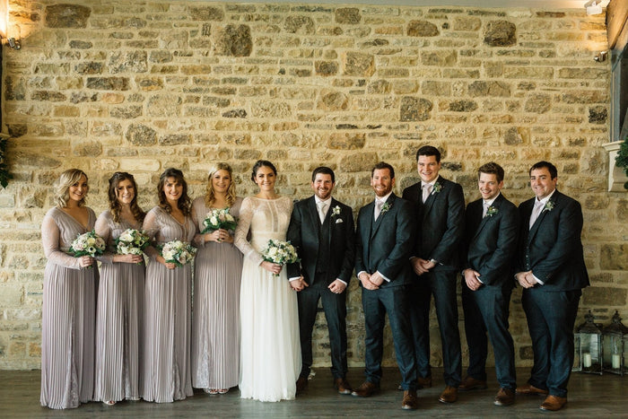 Lavender Frost Tie - Wedding Accessory | Handmade Men’s Necktie worn by groomsmen in a rustic wedding setting, complementing lavender dresses.