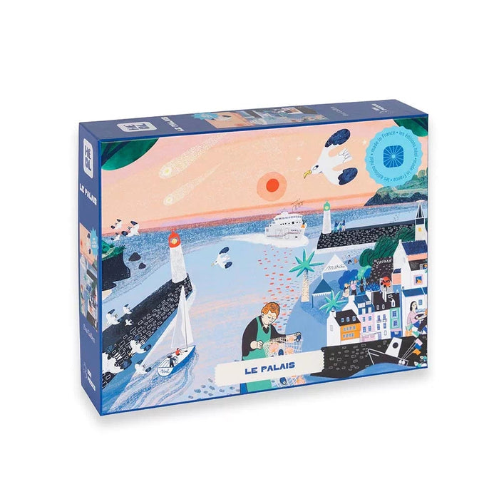 Heol Editions' "Le Palais | 500 Piece Jigsaw Puzzle" comes in a rectangular box and features Eva Gallen’s illustrated coastal town scene with boats, lighthouses, seagulls, and people by the sea.