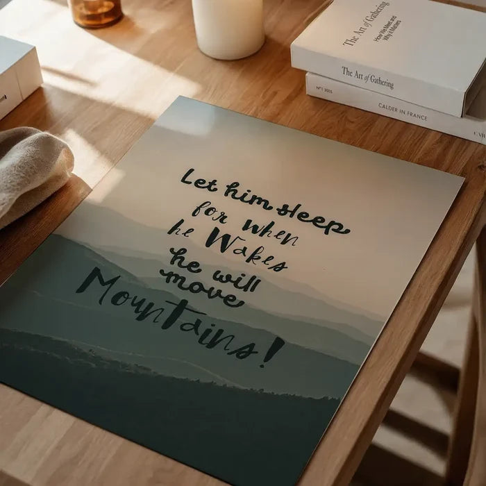 Scandinavian style print with "Let Him Sleep" quote, subtle mountain background, and playful fonts.