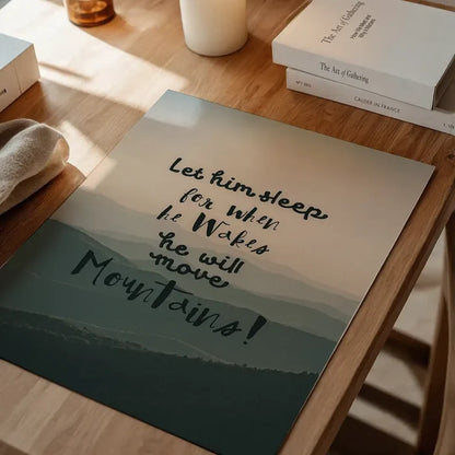 Scandinavian style print with "Let Him Sleep" quote, subtle mountain background, and playful fonts.