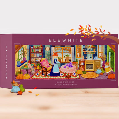 The Elewhite “Look What I Got” 1,000-piece jigsaw puzzle features original art of a cozy autumn room with animals, pumpkins, and a woman in a blue dress serving tea, all on premium puzzle board.