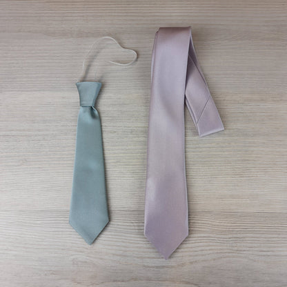 Midnight Boys Ties shown in elastic mint and self-tie lilac styles. Perfect polyester neckties for children aged 5-12, dry clean only.