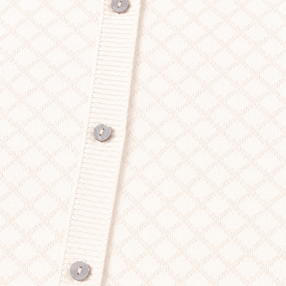 Close up of buttons and pattern on Milan Dove White Lux Jacquard Knit Baby Jumpsuit andHat and Bootie 3pc SET Organic cotton