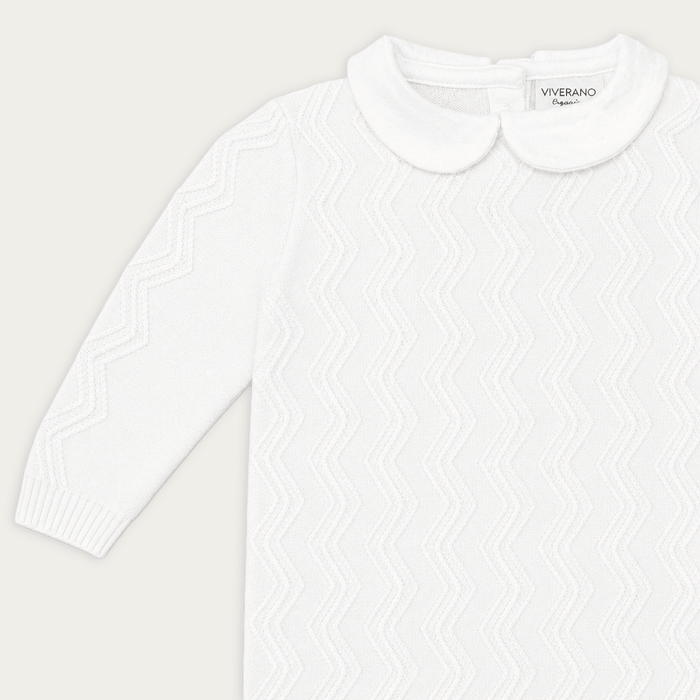 close up of milan dove white peter pan fancy chevron knit baby jumpsuit made with organic cotton