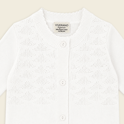 detail of milan dove white delicate pointelle knit baby jumpsuit made with organic cotton