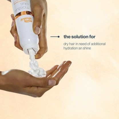 Hand applying milk_shake moisture plus whipped cream to another hand with text about hair care solution.