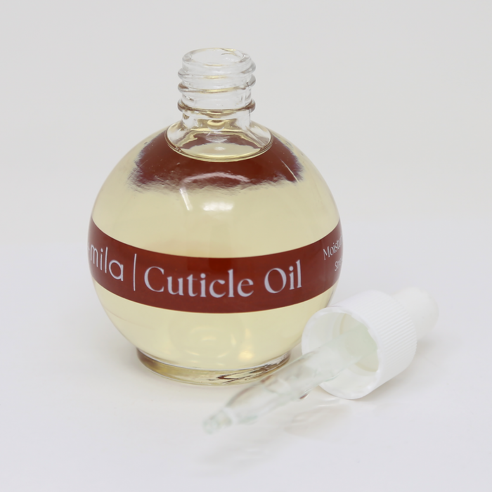 Sweet Almond & Castor cuticle oil round bottle with the dropper cap beside it