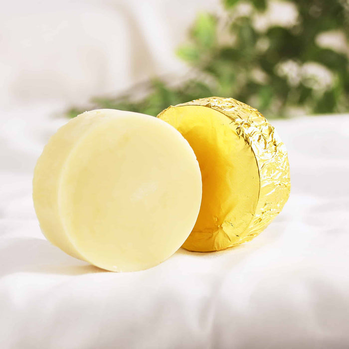Organic unscented massage bar unwrapped, showing raw cocoa and shea butter texture – Valley Mist