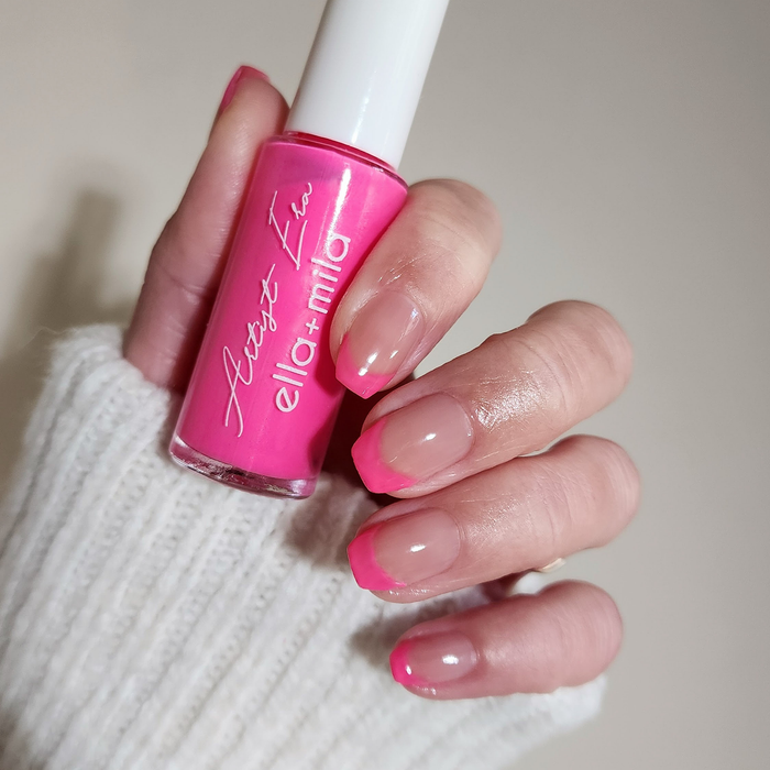Pink Punch liner used for neon pink French tips, holding the bottle