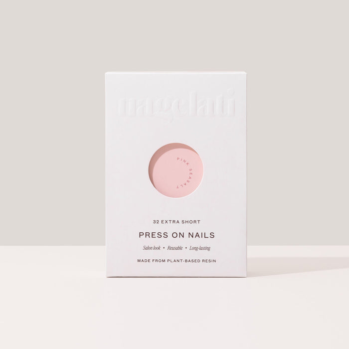 Press-on nails in plastic-free packaging made from FSC-certified paperboard.