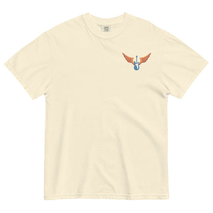 Cream colored Comfort Colors shirt with vintage-style text that reads 'Richard Valenzuela and his Flying Guitar' with an image of a blue guitar and orange wings from Sew Bonita in Corpus Christi, Texas