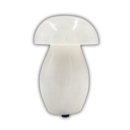 White mushroom-shaped lamp on a white background
